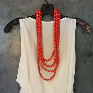 Coral red multistrand beaded necklace